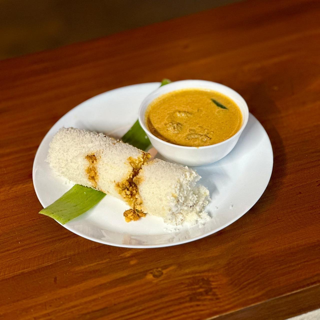 Puttu with curry - traditional Kerala breakfast